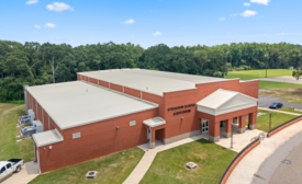 A new auditorium for the Straughn School District in Andalusia, Ala., includes an all-white roof.